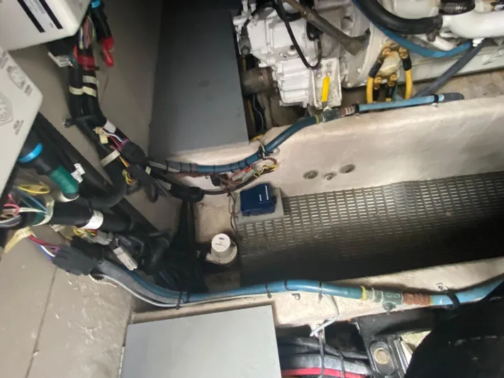 Sea Shack Yacht Photos Pics Engine compartment of a 2013 Meridian 391 boat, showing wiring and components.