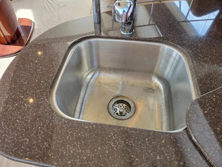 Sea Shack Yacht Photos Pics Stainless steel sink in 2013 Meridian 391 yacht kitchen.