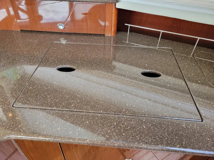Sea Shack Yacht Photos Pics Luxurious 2013 Meridian 391 yacht kitchen countertop with sleek, glossy finish.