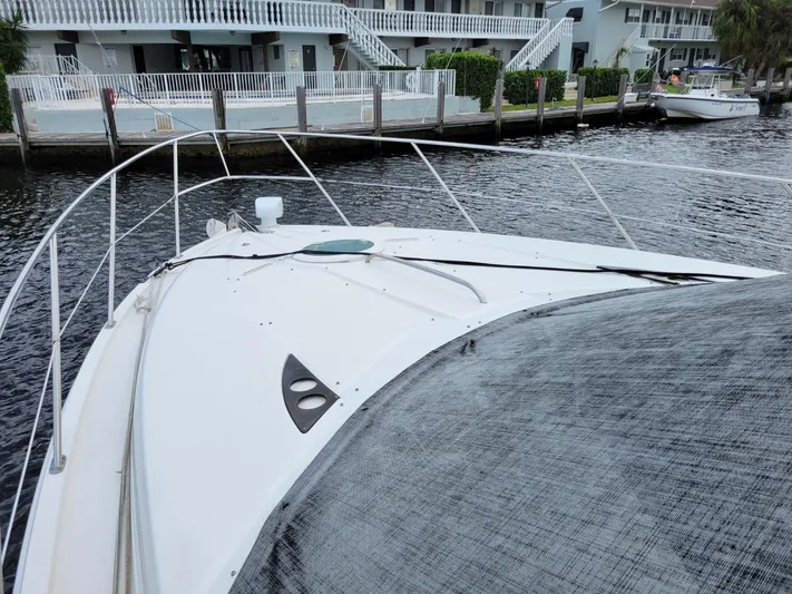 Sea Shack Yacht Photos Pics 2013 Meridian 391 yacht docked by waterfront homes.