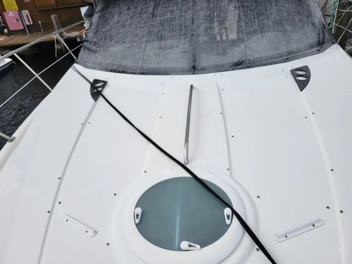 Sea Shack Yacht Photos Pics 2013 Meridian 391 yacht deck with circular hatch and railing.