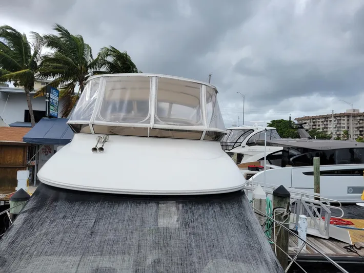 Sea Shack Yacht Photos Pics 2013 Meridian 391 yacht docked under cloudy skies.