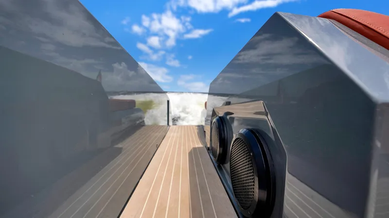 Vesper Yacht Photos Pics 2017 Vanquish Yachts VQ 54 deck with sleek design and blue sky background.