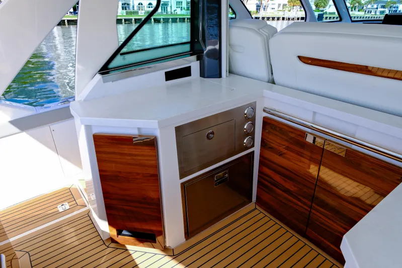 Feeling Knotty Yacht Photos Pics 2023 Tiara Yachts 48 LS interior with sleek cabinetry and modern design.