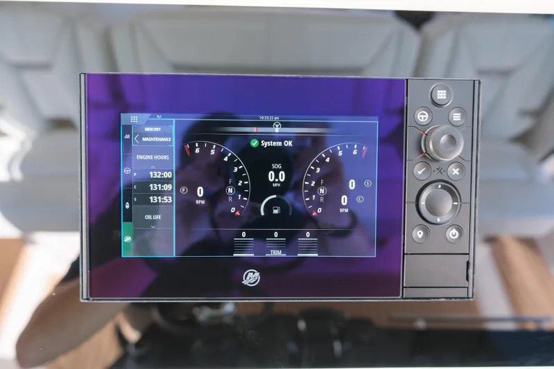 Feeling Knotty Yacht Photos Pics Dashboard display of 2023 Tiara Yachts 48 LS showing system status and engine hours.