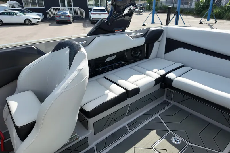  Yacht Photos Pics 2025 Supreme S220 boat interior with modern seating and sleek design.