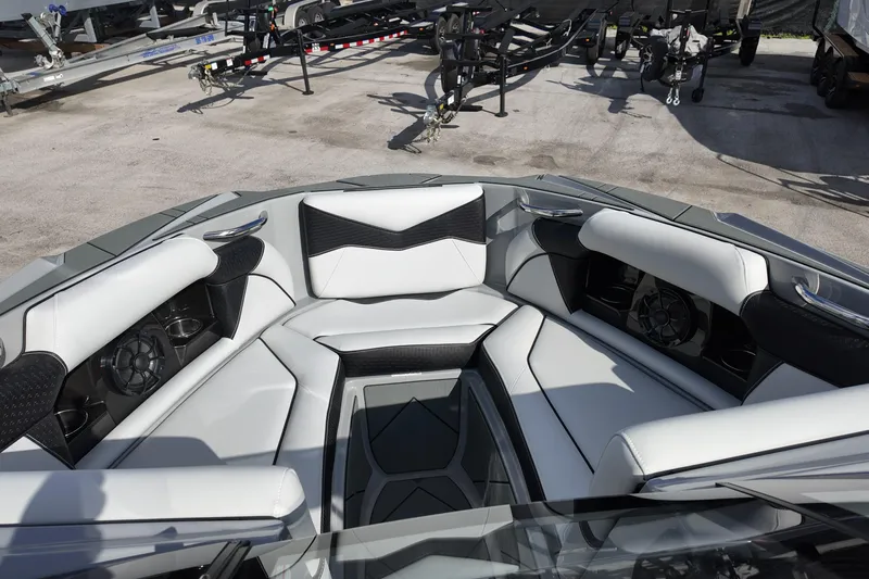  Yacht Photos Pics Luxurious interior of 2025 Supreme S220 boat with sleek seating and modern design.