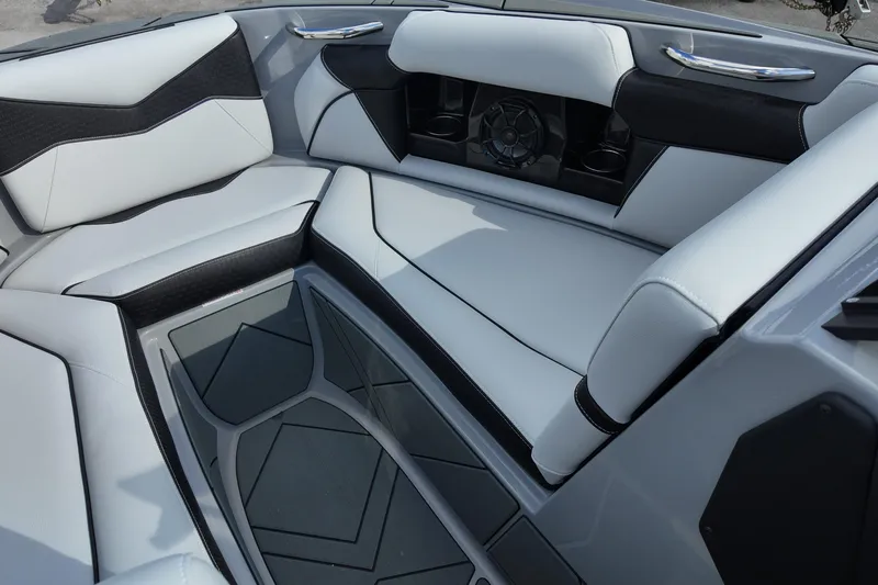  Yacht Photos Pics Luxurious interior of 2025 Supreme S220 boat with sleek seating and modern design.