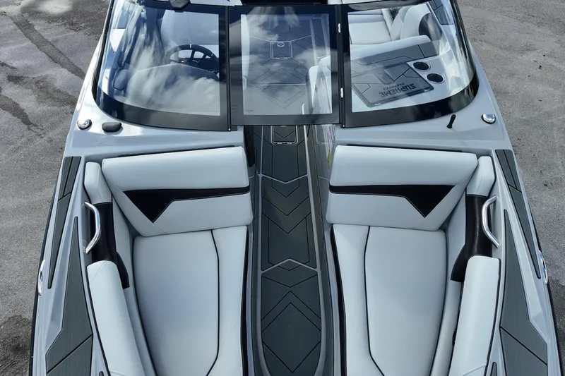  Yacht Photos Pics 2025 Supreme S220 boat interior with sleek seating and modern design.
