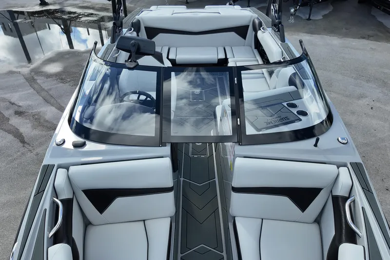  Yacht Photos Pics 2025 Supreme S220 boat interior with sleek design and modern seating arrangement.
