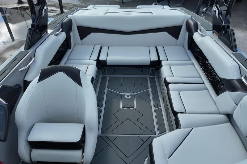  Yacht Photos Pics Luxurious interior of 2025 Supreme S220 boat with sleek seating and modern design.