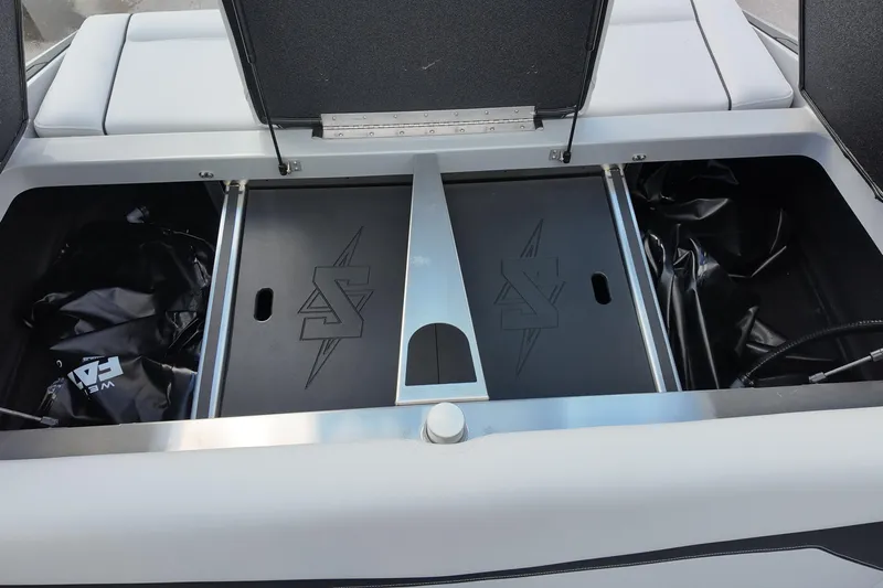  Yacht Photos Pics Open storage compartment of 2025 Supreme S220 boat, featuring sleek design and ample space.