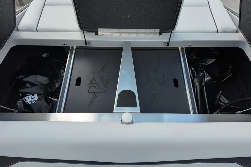  Yacht Photos Pics Open storage compartment of 2025 Supreme S220 boat, featuring sleek design and ample space.