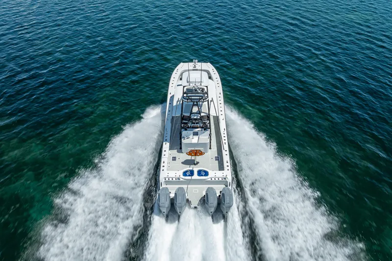  Yacht Photos Pics 2024 Freeman 43 boat cruising on open water, aerial view.