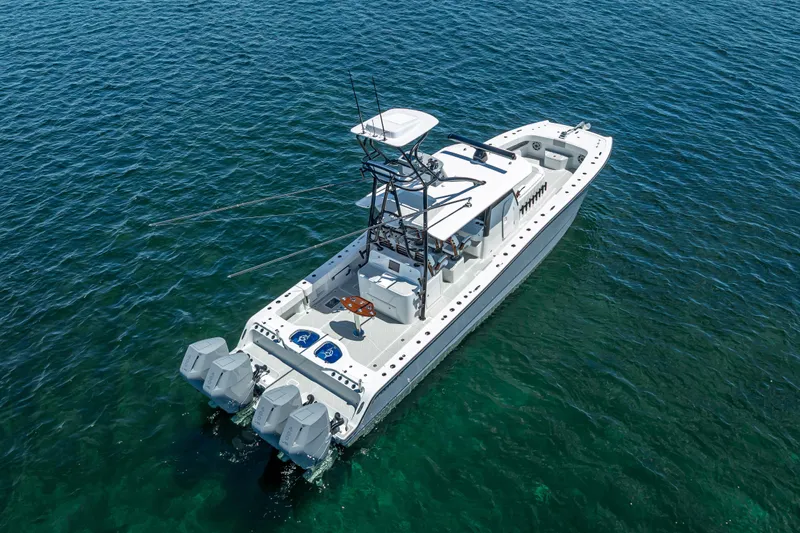  Yacht Photos Pics 2024 Freeman 43 boat on clear blue water, aerial view.