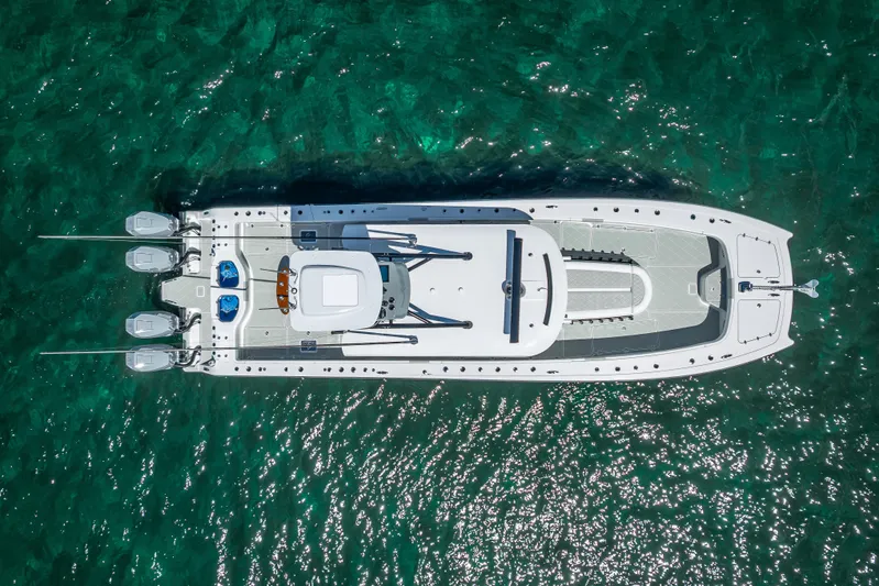  Yacht Photos Pics Aerial view of 2024 Freeman 43 boat on clear turquoise water.