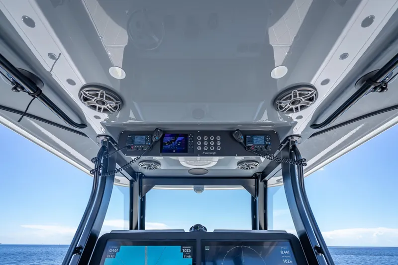  Yacht Photos Pics 2024 Freeman 43 boat dashboard with advanced navigation and communication systems, ocean view.