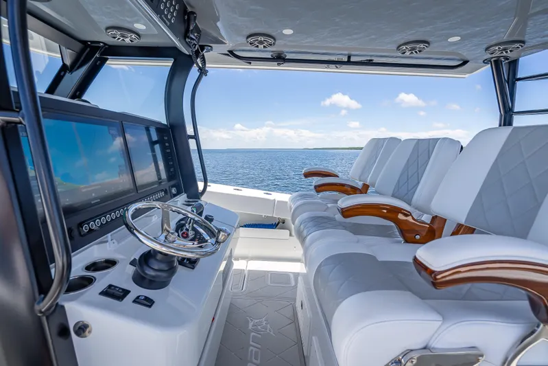  Yacht Photos Pics Luxurious 2024 Freeman 43 boat interior with plush seating and advanced navigation system.