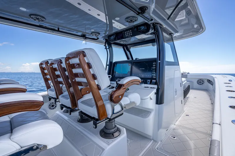  Yacht Photos Pics 2024 Freeman 43 boat interior with luxurious seating and advanced navigation system.