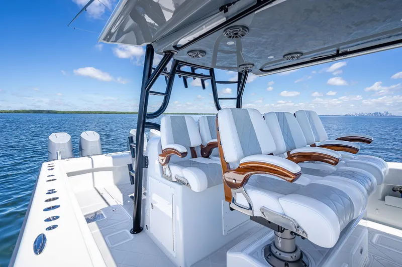  Yacht Photos Pics Luxury seating on a 2024 Freeman 43 boat, cruising on a sunny day.