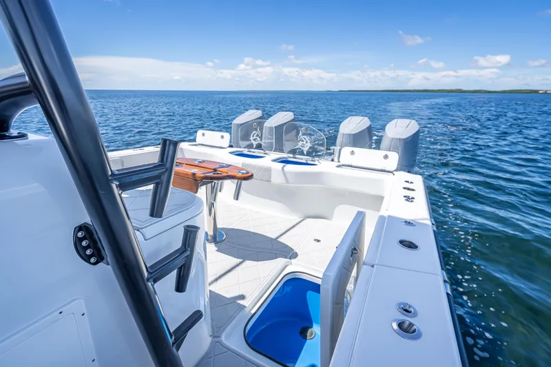  Yacht Photos Pics 2024 Freeman 43 boat interior with ocean view, featuring modern design and multiple engines.