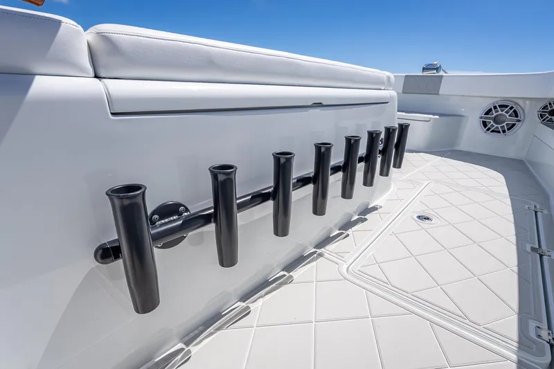  Yacht Photos Pics 2024 Freeman 43 boat interior with rod holders and speakers on deck.