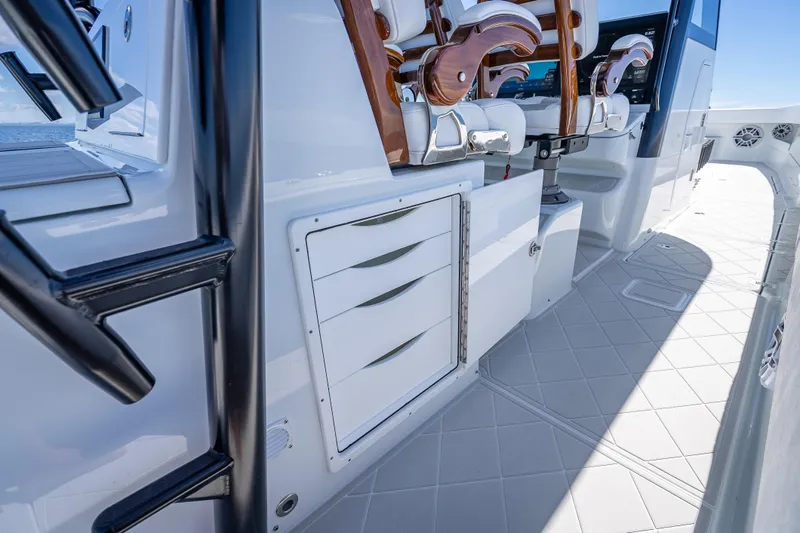  Yacht Photos Pics 2024 Freeman 43 boat interior with sleek seating and storage drawers.
