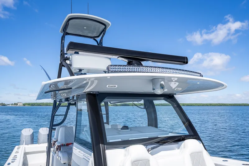  Yacht Photos Pics 2024 Freeman 43 boat with advanced navigation equipment on a sunny day.