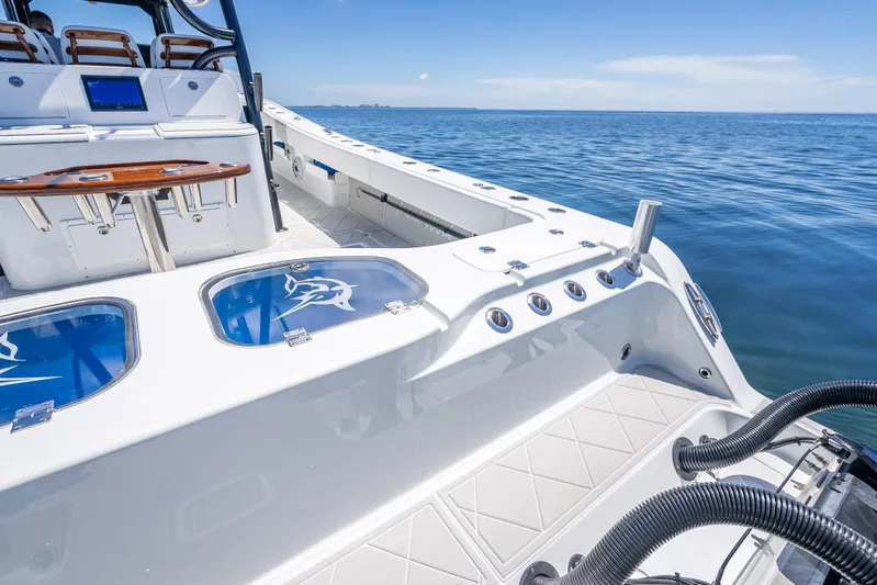  Yacht Photos Pics 2024 Freeman 43 boat interior with seating and ocean view.