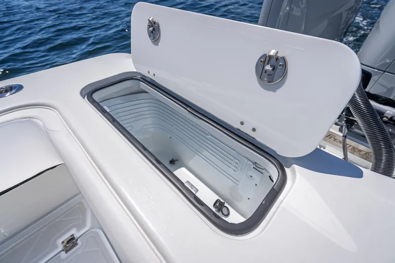  Yacht Photos Pics Open storage compartment on 2024 Freeman 43 boat, showcasing sleek design and functionality.