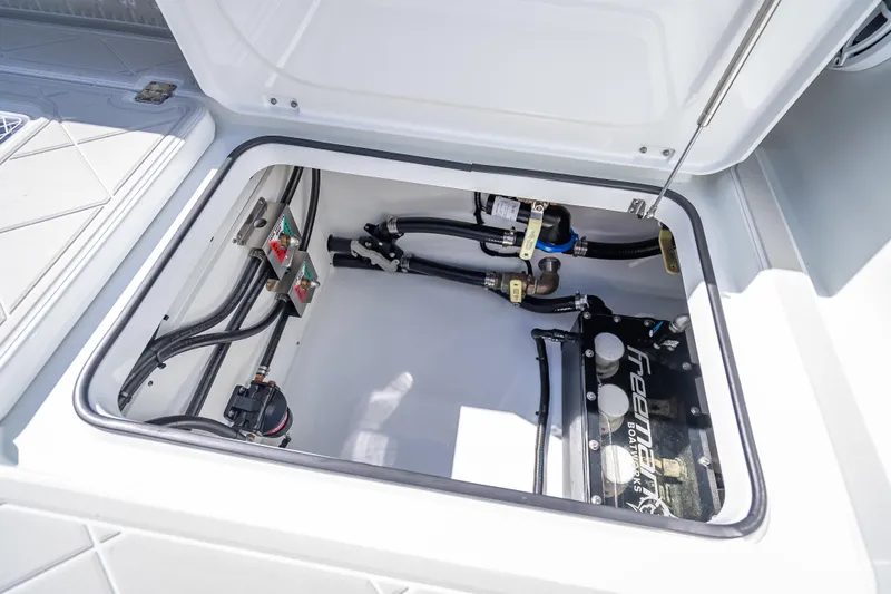  Yacht Photos Pics 2024 Freeman 43 boat compartment showcasing internal wiring and components.