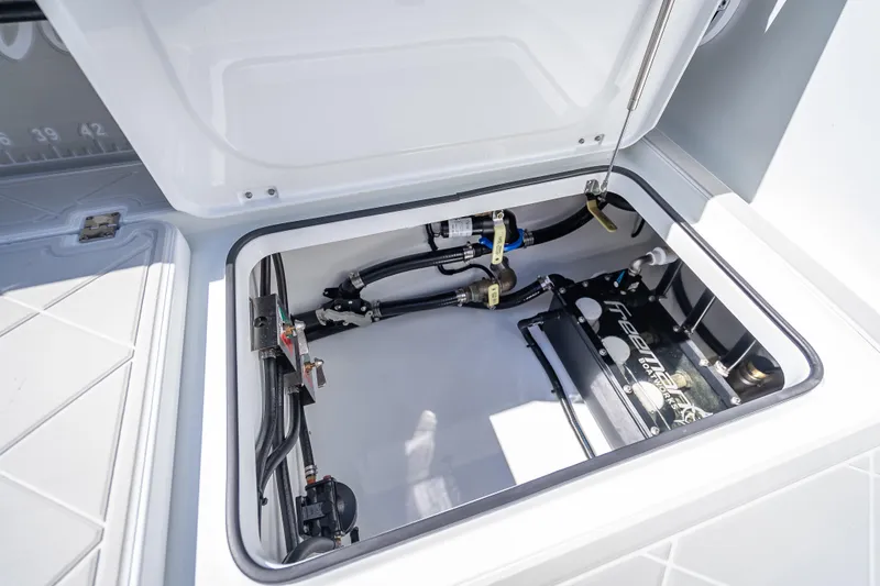  Yacht Photos Pics Open hatch of 2024 Freeman 43 boat showing internal components and wiring.