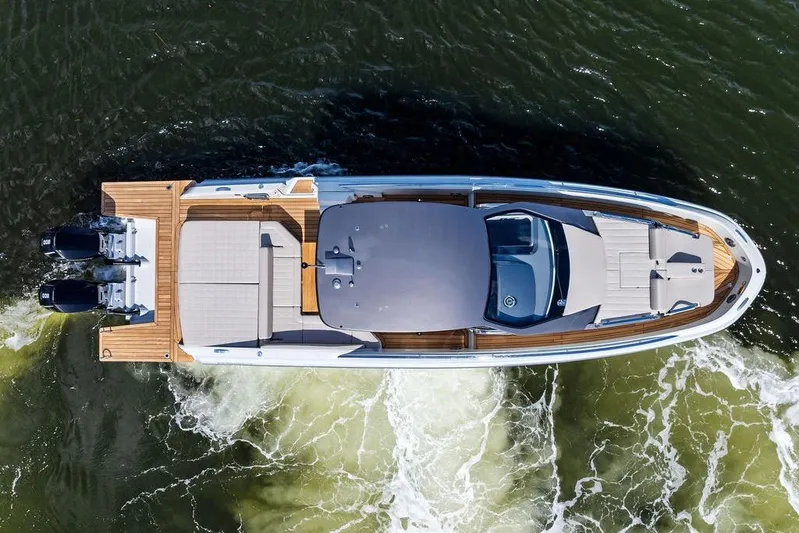  Yacht Photos Pics Aerial view of 2025 SACS 40 Rebel boat cruising on water.