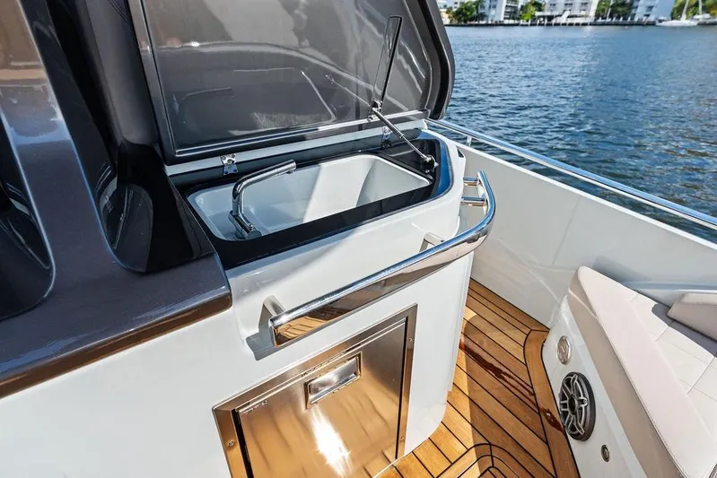  Yacht Photos Pics Luxury SACS 40 Rebel 2025 yacht with sleek sink and wooden deck details.