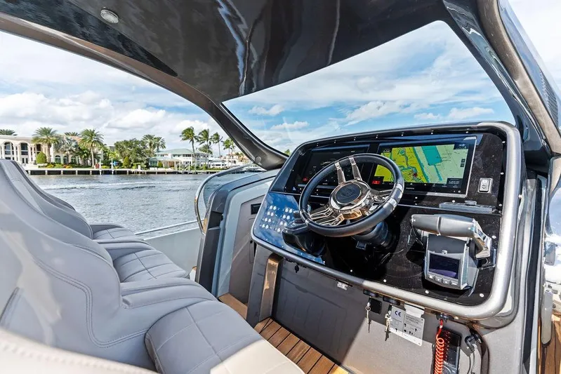  Yacht Photos Pics 2025 SACS 40 Rebel yacht cockpit with modern navigation system and luxurious seating.