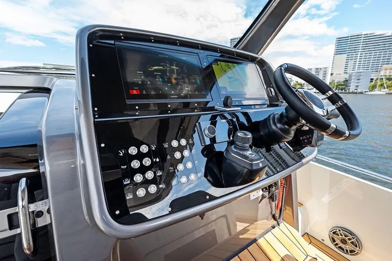  Yacht Photos Pics Cockpit of 2025 SACS 40 Rebel boat with modern controls and steering wheel.