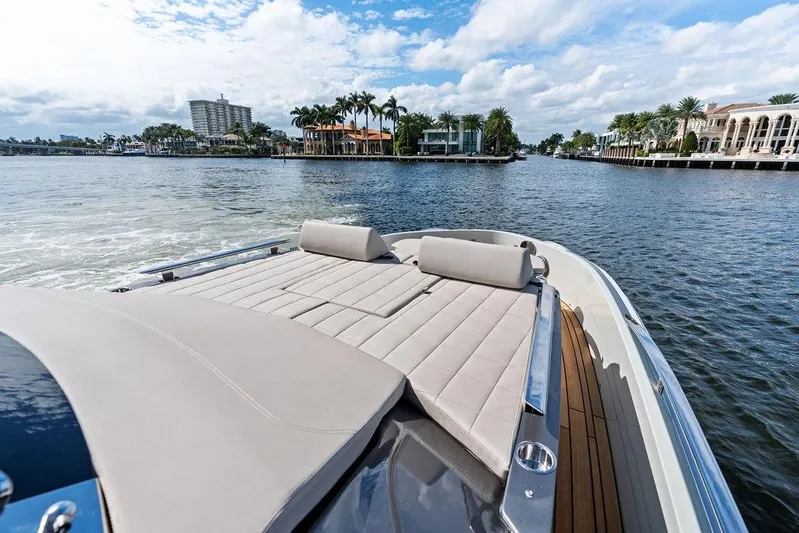  Yacht Photos Pics Luxurious 2025 SACS 40 Rebel yacht cruising on a scenic waterway.