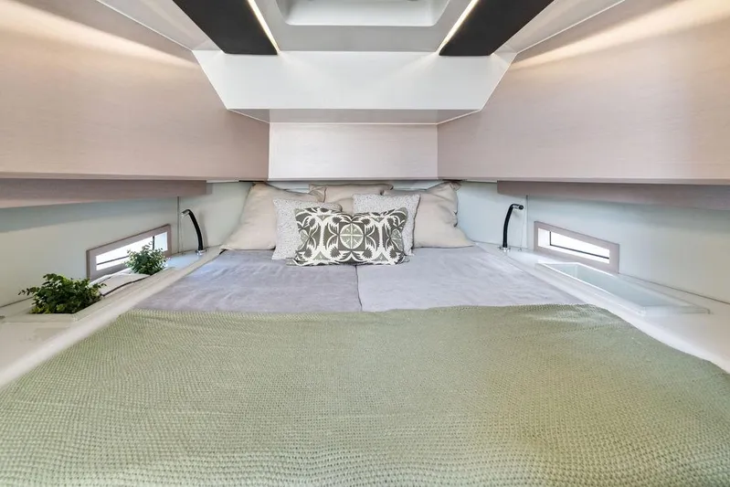  Yacht Photos Pics Luxurious cabin interior of 2025 SACS 40 Rebel with cozy bedding and modern design.