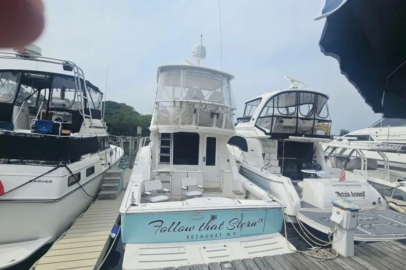 Follow That Stern Ix Yacht Photos Pics 2007 Tiara Yachts 3900 Convertible docked, featuring "Follow that Stern" nameplate.
