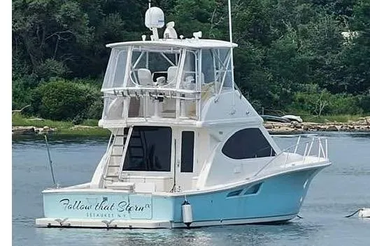 Follow That Stern Ix Yacht Photos Pics 2007 Tiara Yachts 3900 Convertible boat on water, featuring a sleek design and blue hull.