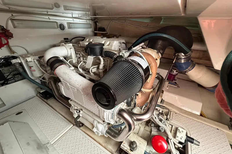 Follow That Stern Ix Yacht Photos Pics Engine room of 2007 Tiara Yachts 3900 Convertible, showcasing detailed machinery components.