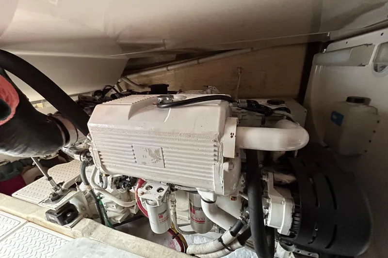 Follow That Stern Ix Yacht Photos Pics Engine room of 2007 Tiara Yachts 3900 Convertible, showcasing mechanical components.