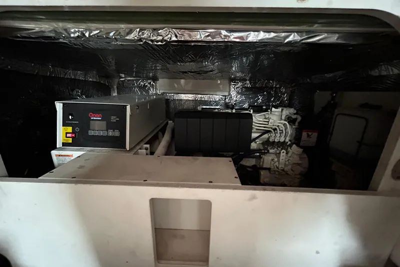 Follow That Stern Ix Yacht Photos Pics Engine room of 2007 Tiara Yachts 3900 Convertible with Onan generator.