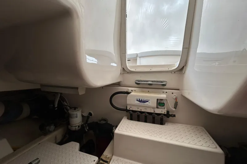 Follow That Stern Ix Yacht Photos Pics 2007 Tiara Yachts 3900 Convertible engine room with Reverso oil change system.