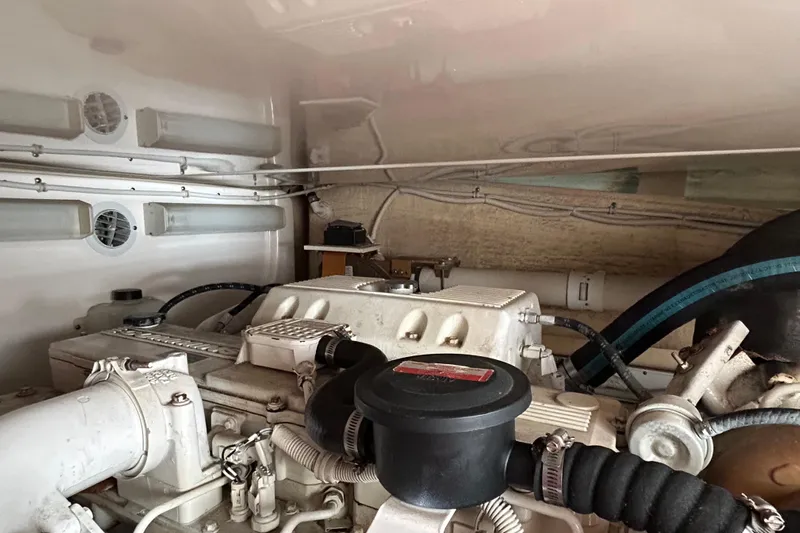 Follow That Stern Ix Yacht Photos Pics Engine room of 2007 Tiara Yachts 3900 Convertible, showcasing mechanical components and wiring.