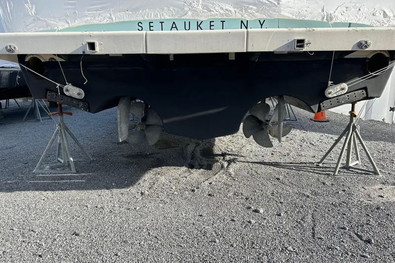 Follow That Stern Ix Yacht Photos Pics 2007 Tiara Yachts 3900 Convertible on stands, Setauket NY, showing propellers and hull.