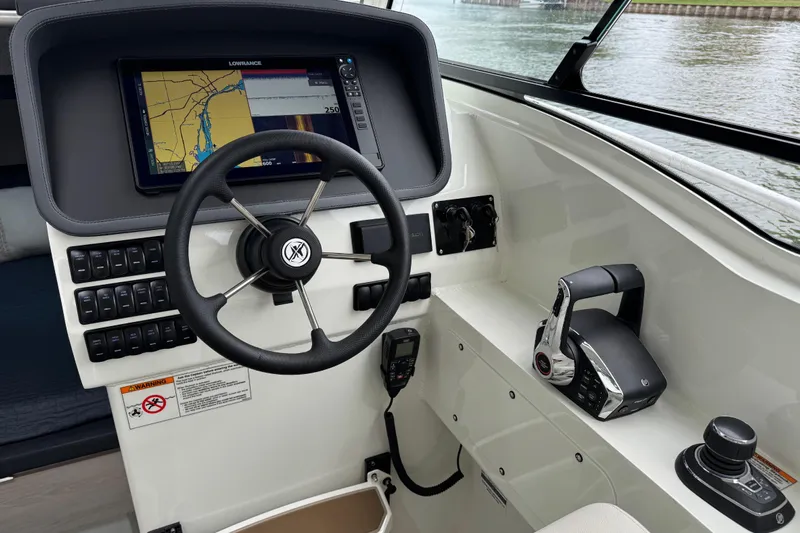  Yacht Photos Pics 2025 Extreme Boats 986 Game King helm with navigation display and controls.