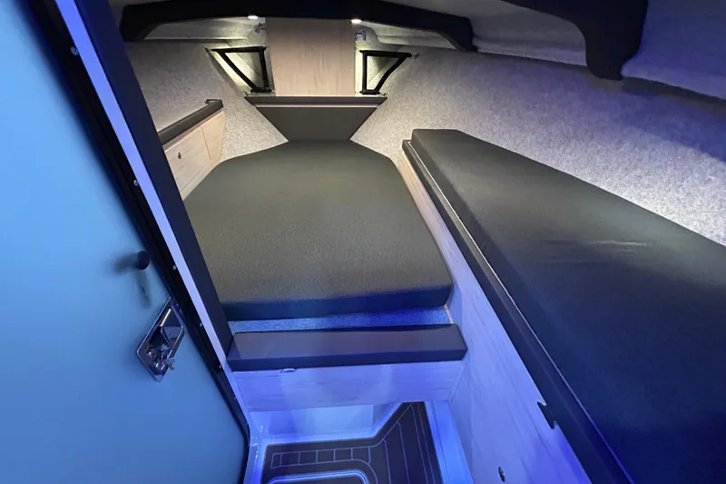  Yacht Photos Pics Interior cabin of 2025 Extreme Boats 986 Game King, featuring modern design and comfortable seating.