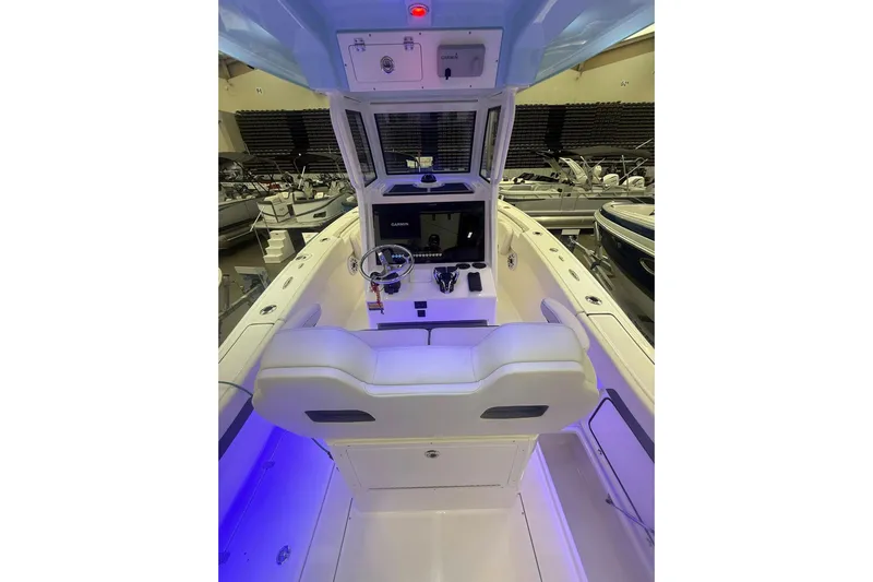  Yacht Photos Pics 2026 Pioneer 250 Pelagic boat interior with modern helm and seating.