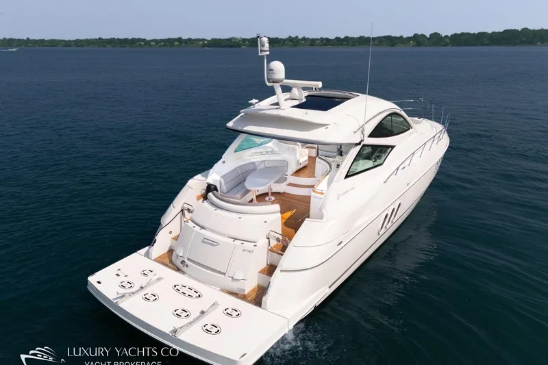  Yacht Photos Pics 2015 Cruisers Yachts 540 luxury yacht cruising on open water.
